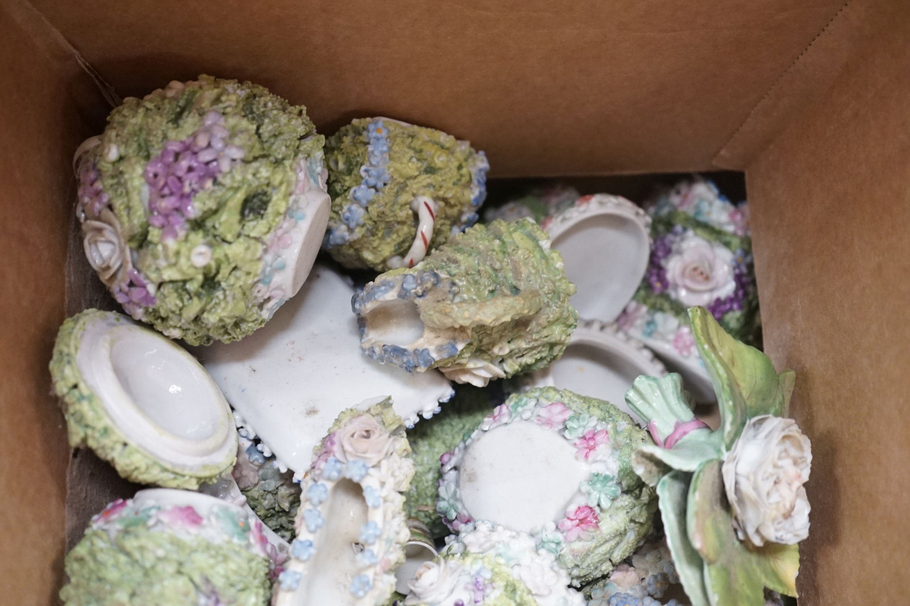 A quantity of floral encrusted mossware